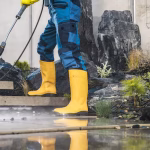 men pressure washing his garden architectural concrete elements 1426 8357